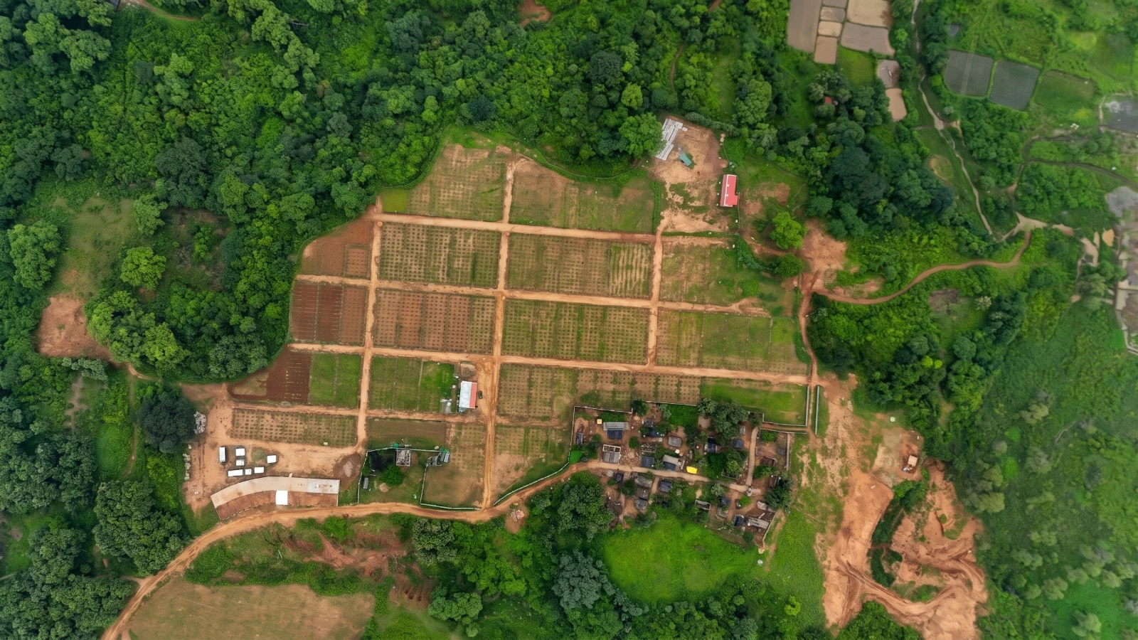 Block A · Plots 217–250 layout thumbnail — real site photo